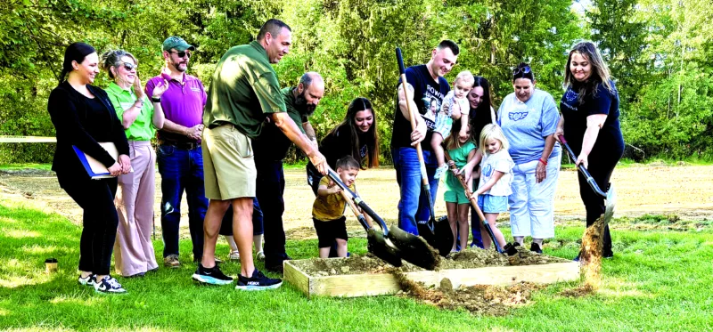 Family members, friends dig in to memorialize Rowan with park